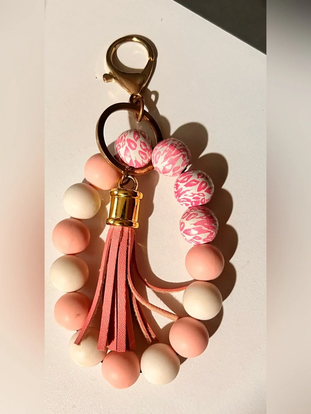 Gold Floral Charm Keychain with White Enamel Accent